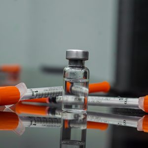 Vial of compounded semaglutide or tirzepatide, and two insulin syringes
